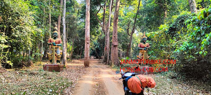 Backpackers travel by motorbike from Vietnam to Cambodia to Laos